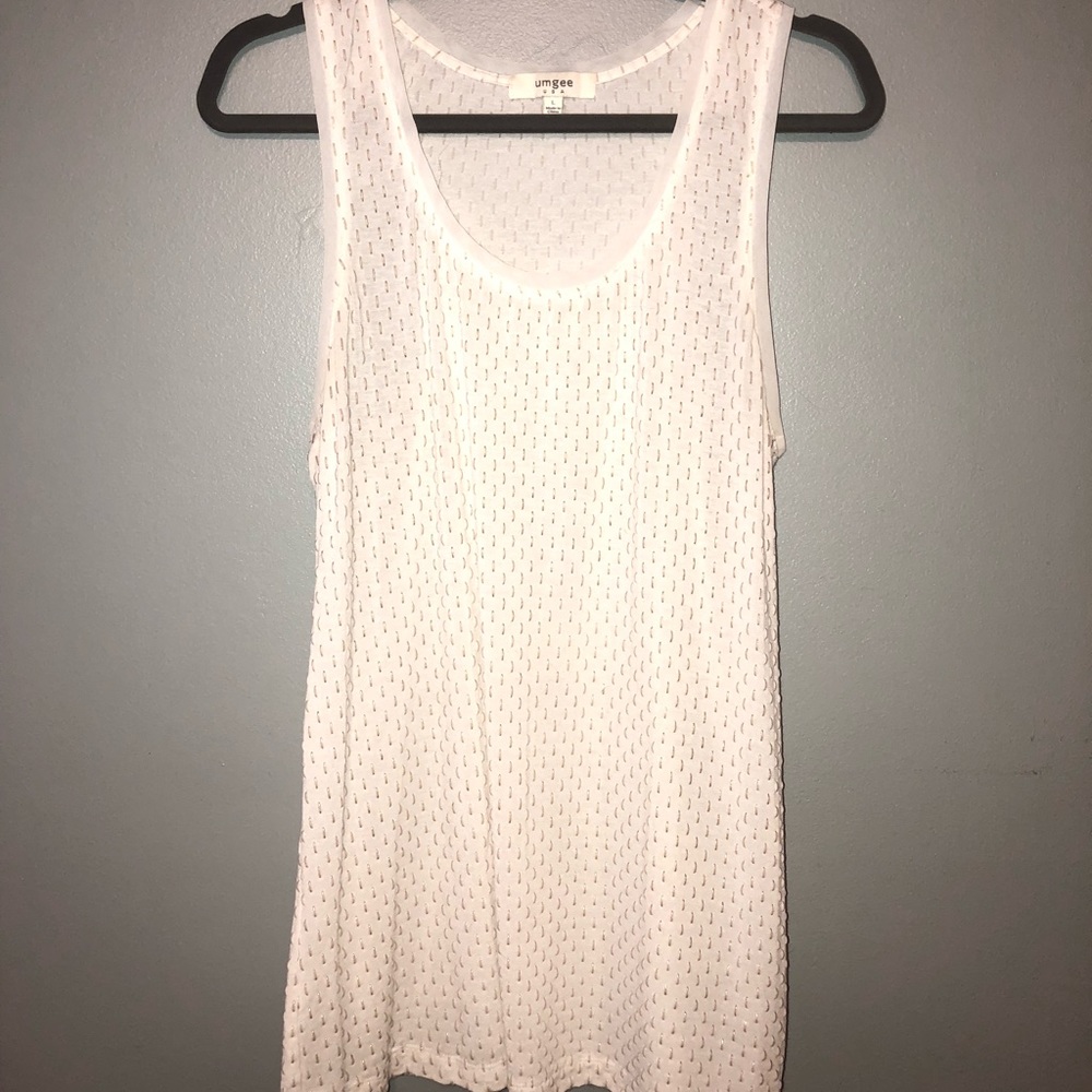 White sleeveless blouse with gold detail